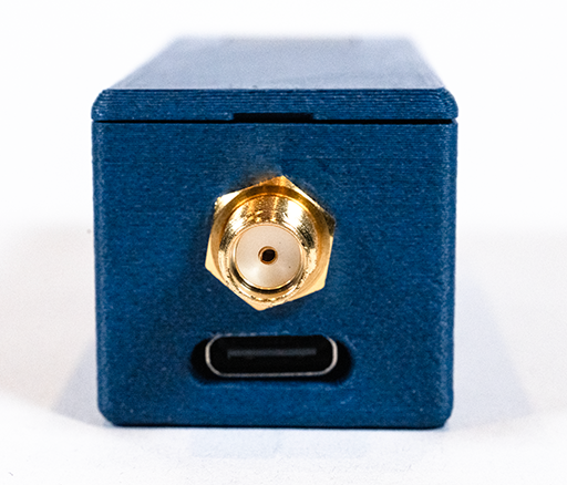 IR100WA back showing gold SMA antenna connector