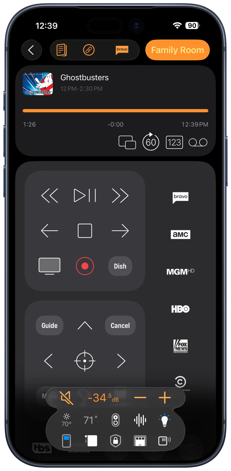 Roomie Remote X app on iPhone showing home theater controls
