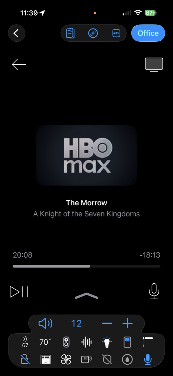Roomie Remote on iPhone controlling an Apple TV playing HBO Max: show title displayed with live position slider at 20:08 elapsed and 18:13 remaining, transport controls, Siri microphone button, and room volume